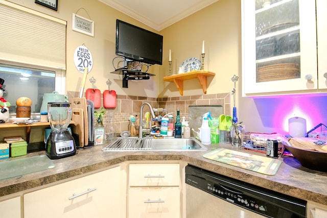 kitchen featuring a sink, white cabinetry, ornamental molding, stainless steel dishwasher, and decorative backsplash