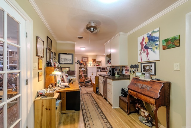 kitchen with ceiling fan, white cabinets, wooden counters, ornamental molding, and light wood finished floors