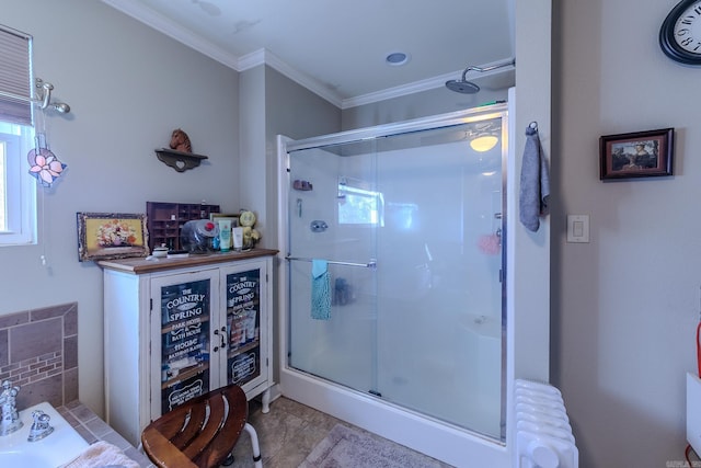 bathroom with a stall shower, radiator heating unit, and ornamental molding