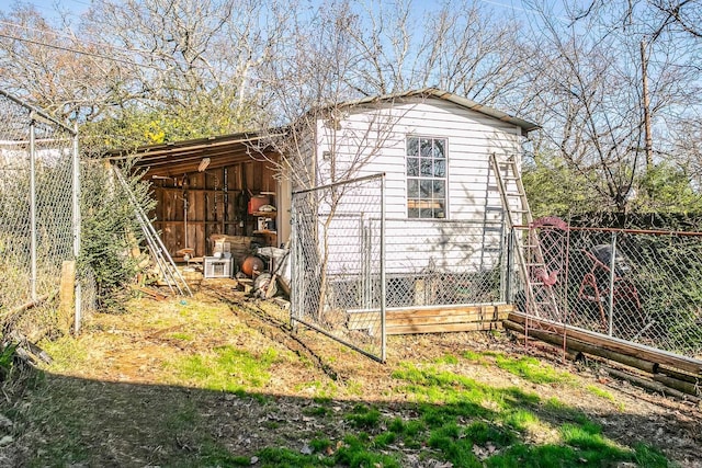 view of outdoor structure with an outdoor structure and fence