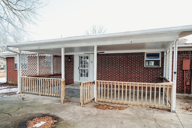 view of front of home featuring brick siding