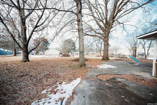 view of yard featuring playground community