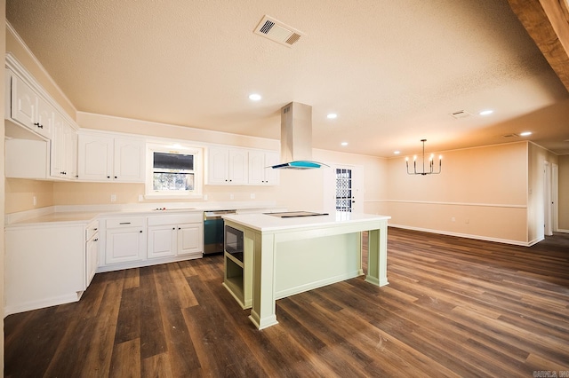 kitchen with dark wood-style flooring, island exhaust hood, visible vents, white cabinetry, and dishwasher