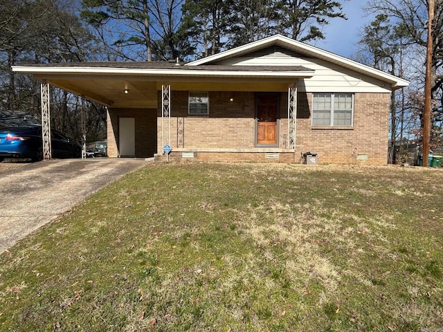 view of front of property with concrete driveway, a front yard, crawl space, an attached carport, and brick siding