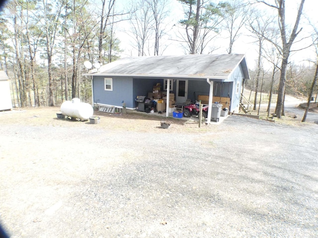 view of pole building featuring driveway