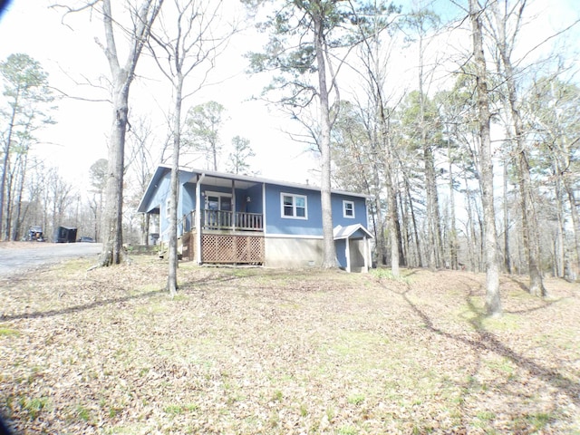 manufactured / mobile home featuring covered porch