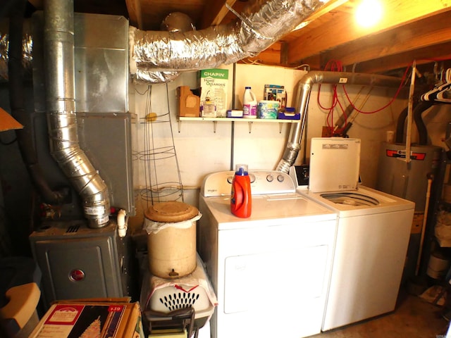 washroom with laundry area and washer and dryer