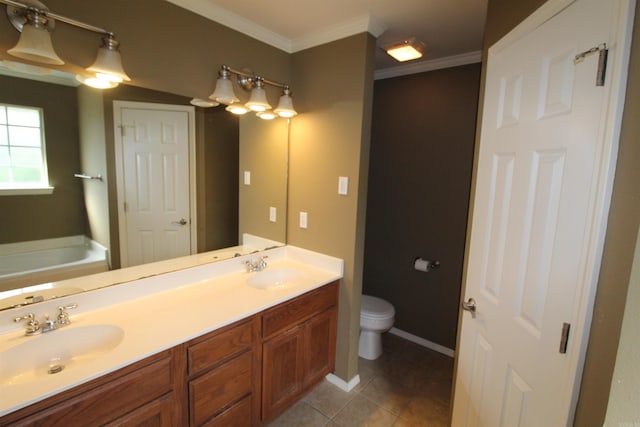 full bathroom featuring ornamental molding, a sink, toilet, and tile patterned floors