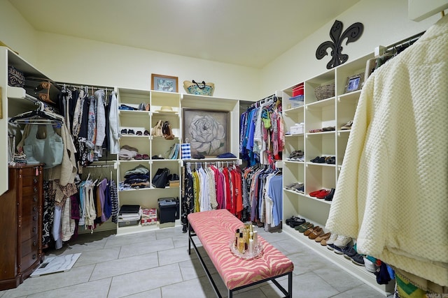 spacious closet featuring tile patterned floors