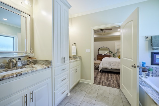 bathroom featuring connected bathroom, crown molding, vanity, and ceiling fan