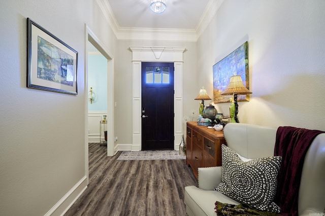 entryway with crown molding, baseboards, and wood finished floors