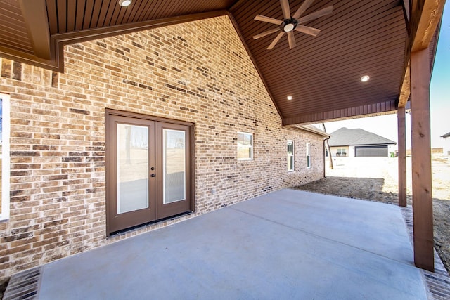 view of patio with ceiling fan and french doors