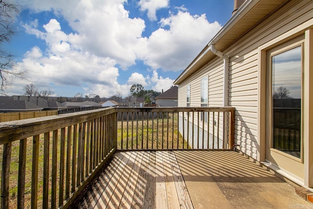 wooden deck featuring a residential view