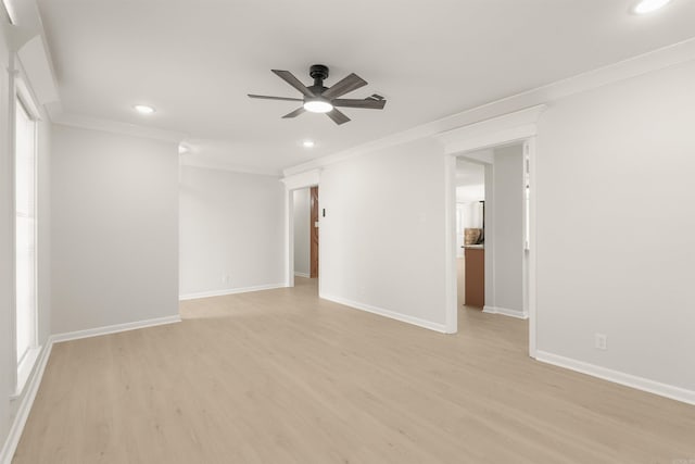 unfurnished room featuring ceiling fan, ornamental molding, and light wood-style flooring