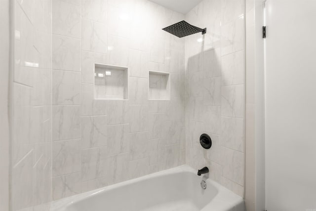 full bath featuring tub / shower combination