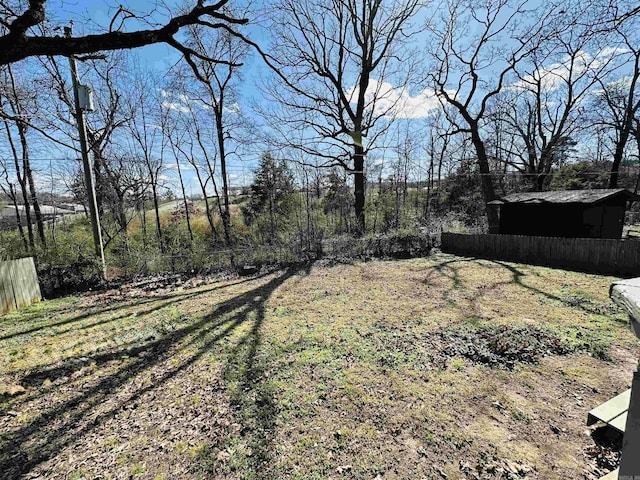 view of yard featuring fence