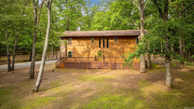 view of outbuilding with fence