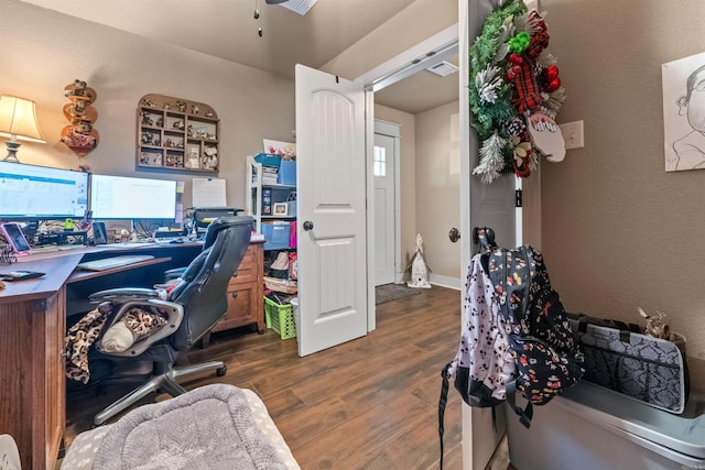 home office featuring dark wood-style floors and visible vents