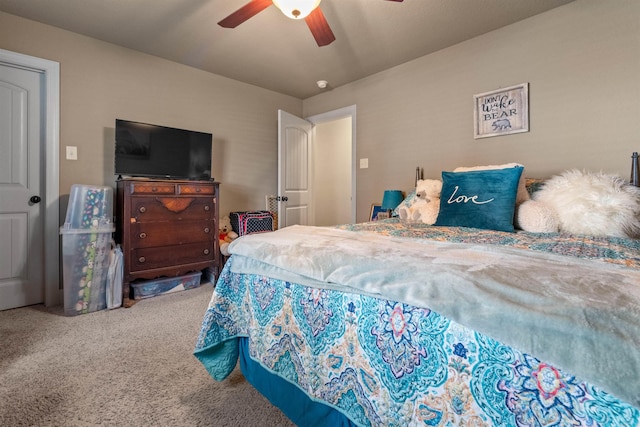 carpeted bedroom with a ceiling fan