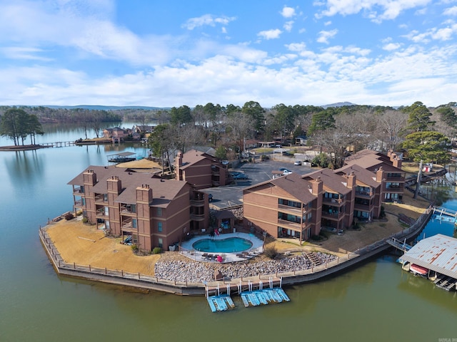 drone / aerial view with a water view