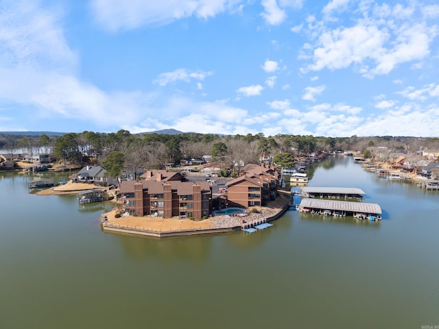 birds eye view of property featuring a water view