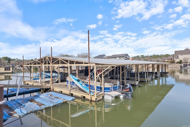 view of dock featuring a water view and boat lift