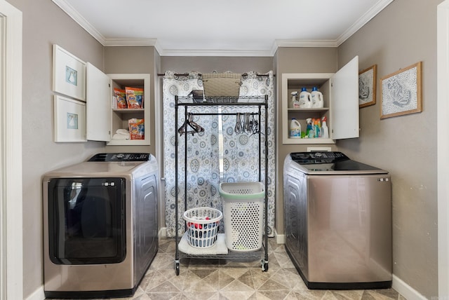 clothes washing area with baseboards, crown molding, and washing machine and clothes dryer