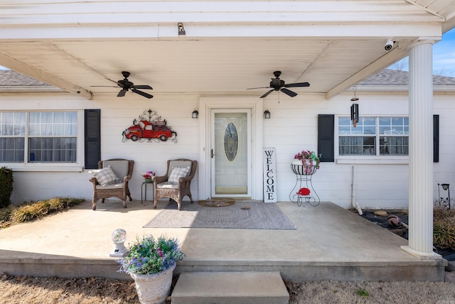 entrance to property featuring a ceiling fan