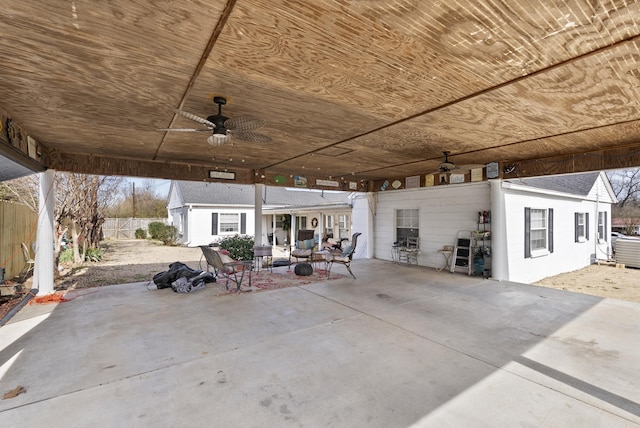 view of patio / terrace featuring fence and a ceiling fan