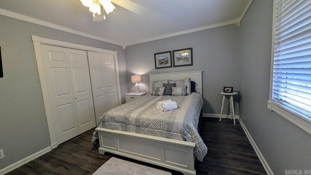 bedroom featuring crown molding, baseboards, and wood finished floors