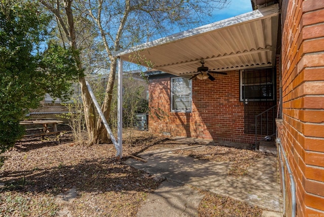 view of patio with ceiling fan