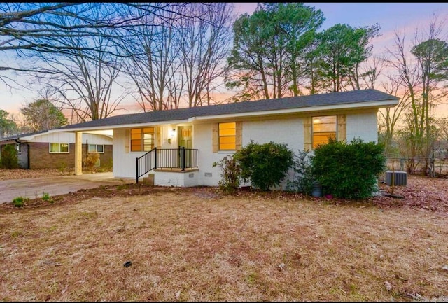 ranch-style house featuring crawl space and central AC