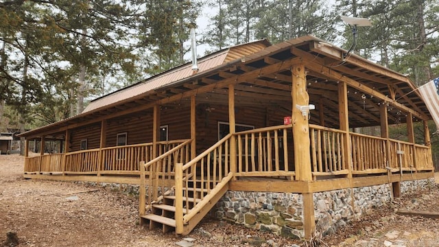 view of home's exterior with metal roof