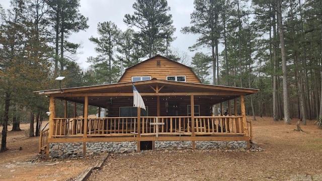 view of front of house with a gambrel roof