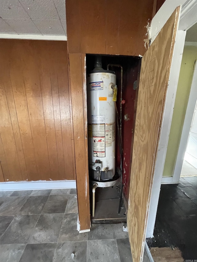 utility room featuring gas water heater