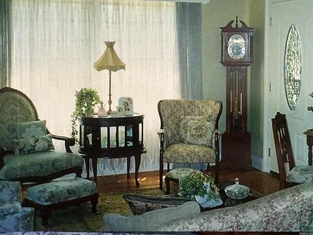 sitting room featuring wood finished floors