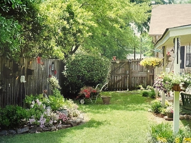 view of yard with a gate and fence