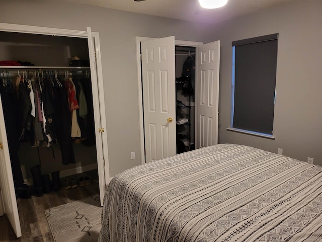 bedroom featuring a closet and wood finished floors