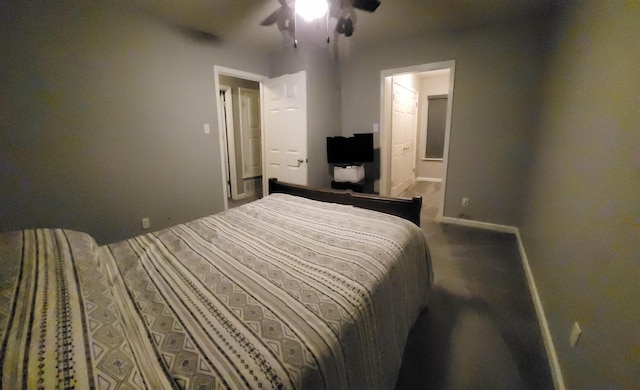 bedroom with ensuite bathroom, a ceiling fan, and baseboards