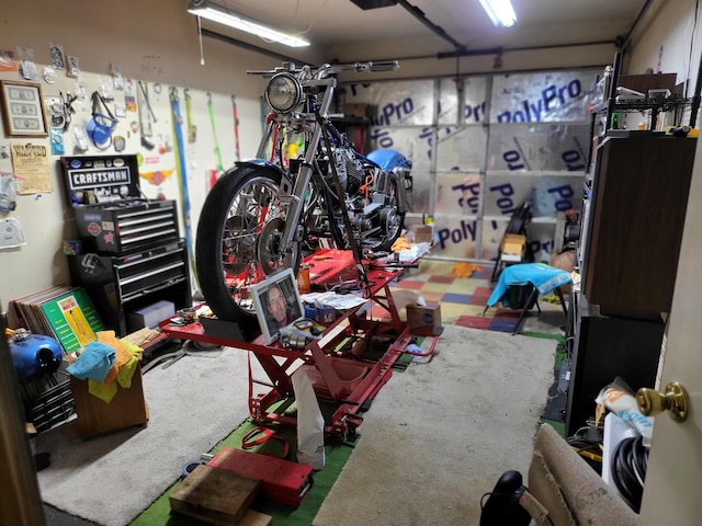 garage with a workshop area