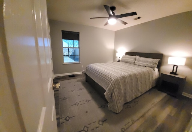 bedroom featuring visible vents, ceiling fan, and baseboards