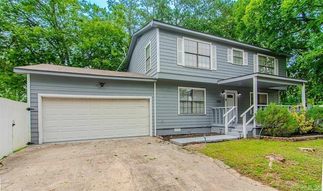 view of front facade with a garage, driveway, a porch, and crawl space