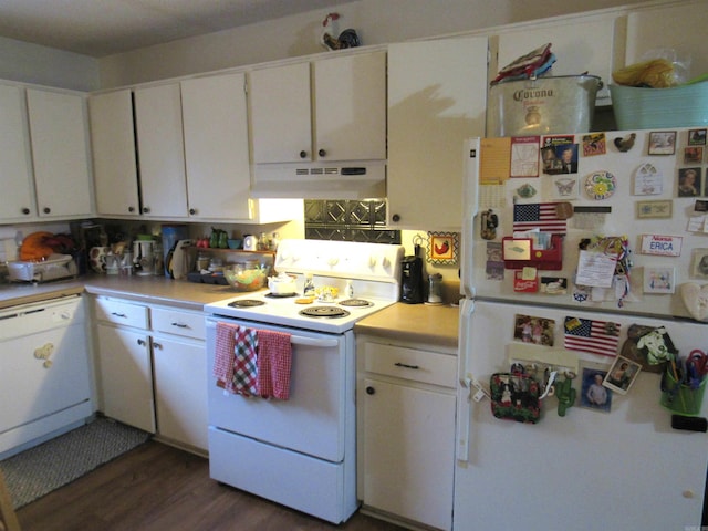 kitchen with under cabinet range hood, white appliances, white cabinets, and light countertops