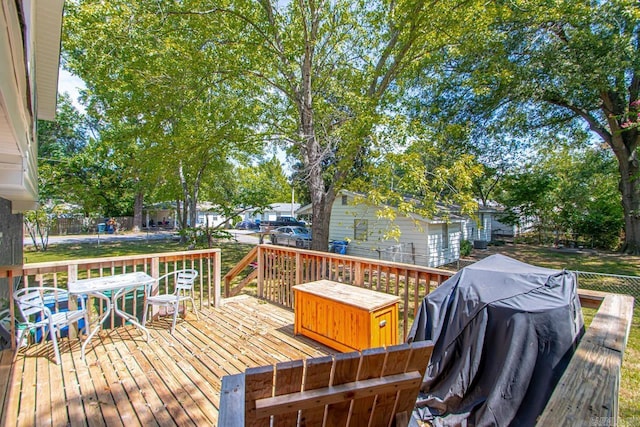 deck featuring fence and grilling area