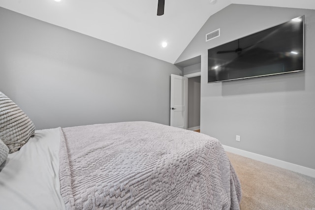 bedroom with ceiling fan, visible vents, baseboards, vaulted ceiling, and carpet