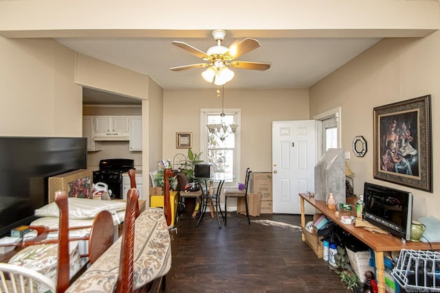 dining space featuring ceiling fan and dark wood-style flooring