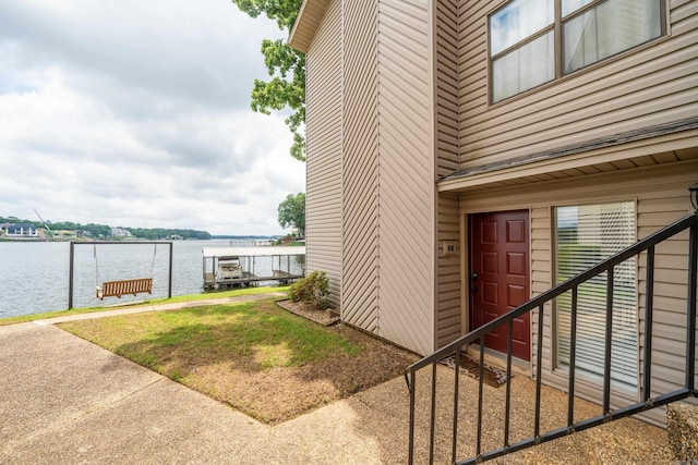 entrance to property featuring a water view