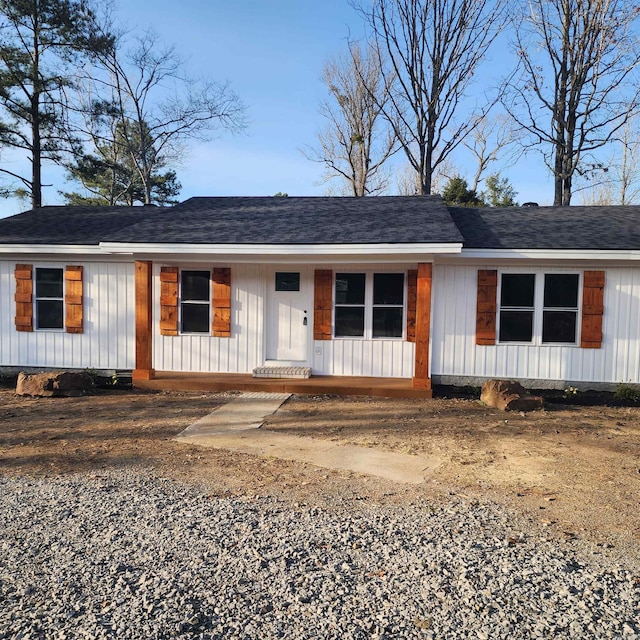 ranch-style home featuring board and batten siding