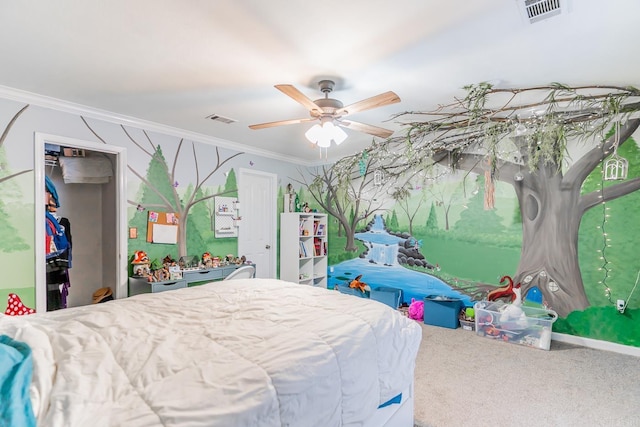 carpeted bedroom with a ceiling fan, visible vents, and crown molding