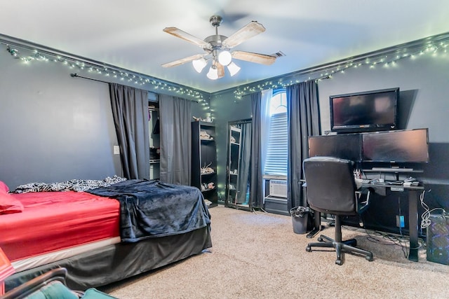 bedroom with a ceiling fan, cooling unit, visible vents, and carpet flooring